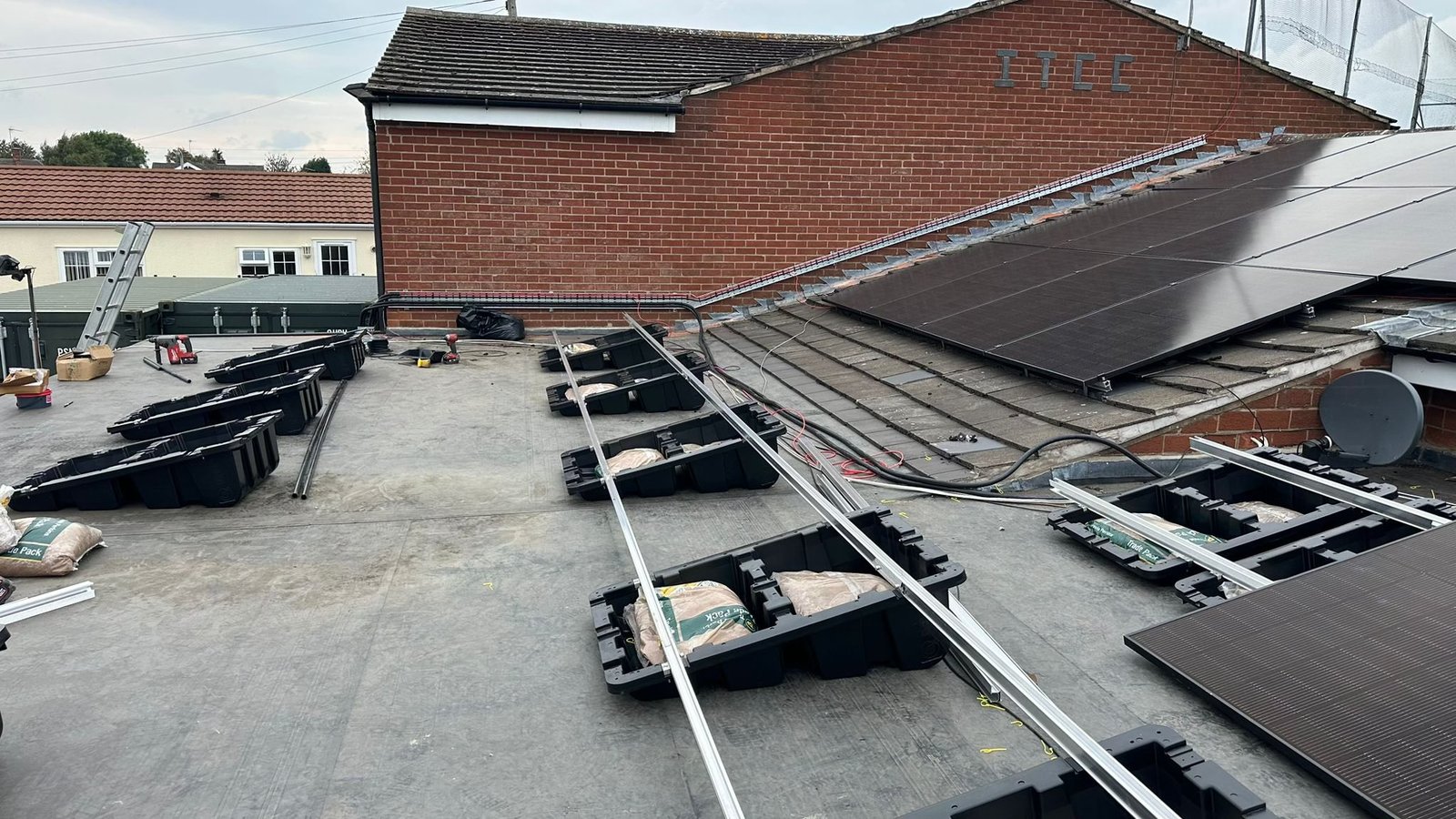 FastTub installation stages on a flat roof