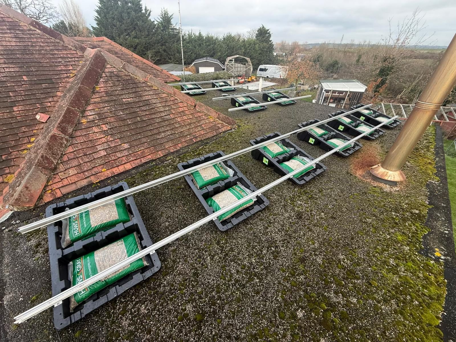 FastTub loaded with ballast on a flat roof solar install